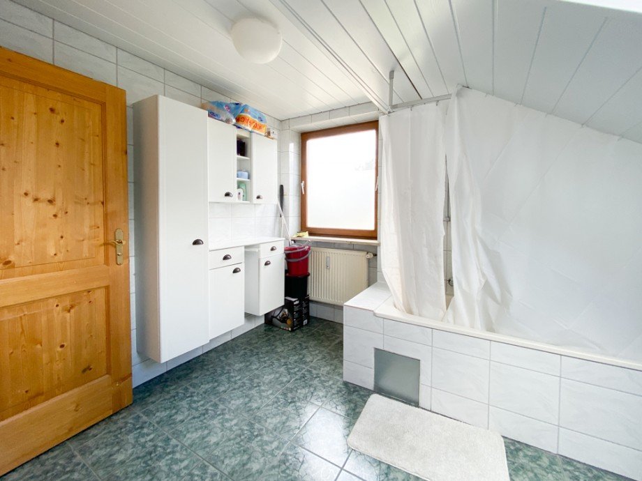Bad Dachgeschosswohnung Germering / Unterpfaffenhofen